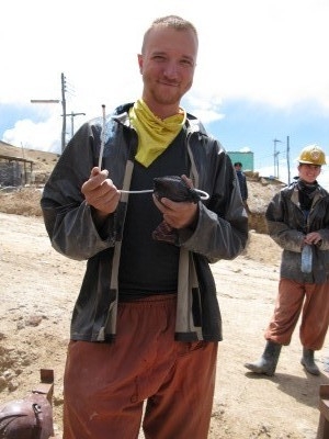 Saben holding lit dynamite, Lin at safe distance Saben holding lit dynamite, Lin at safe distance