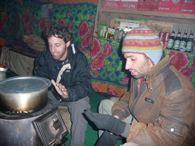 Warming by the Yak-dung fire, Mouint Everest Tibet Warming up by the Yak dung fire