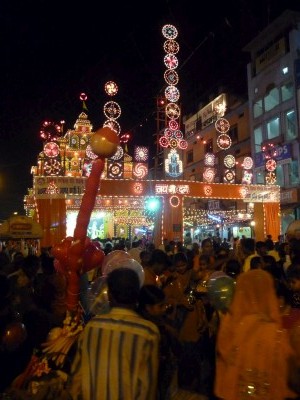 Lights in the streets of india Festivities in the streets in front of the train station